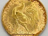 une image représentant une pièce d'or sur laquelle figure un coq