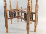 a wooden table that has a abanaclet on it