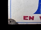 a close up of a license plate for a liquor company