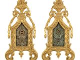 pair of gilet - style gilves with glass panels in the form of a clock