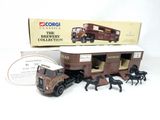 a toy truck with horses and a horse trailer in it