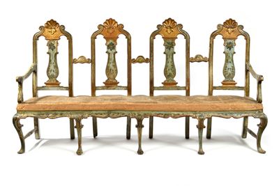 four chairs that are sitting next to each other