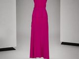 purple dress on a mannequin stand in a room