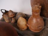 many different types of vases on the table