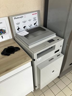 a refrigerator and a freezer in a small kitchen