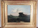 an oil painting of a landscape with a river and trees in a gold frame