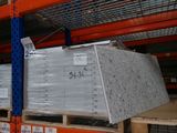 a large stack of boxes on a pallet in a warehouse