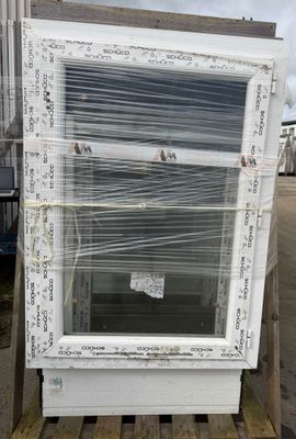a large window that has been wrapped up on a pallet
