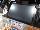 une photo d'une caisse enregistreuse dans une épicerie