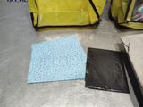 two bags and a pair of scissors sitting on a table