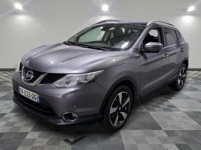 a grey nissan qx - v parked on a checkered floor