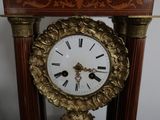 a clock that is sitting on top of a table