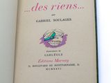 an open book with a picture of a bird on it