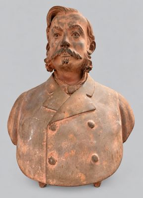 statue of a man with a mustache and a moustache on his face
