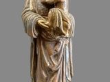 an image of a statue of a woman holding a child