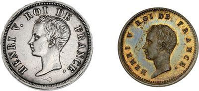 deux types différents de pièces d'argent, l'une à l'effigie d'une femme et l'autre à l'effigie d'un homme