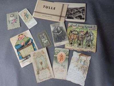 many old postcards on a table with a blue background