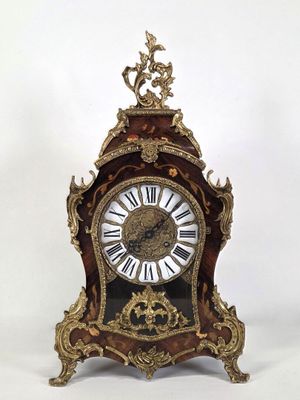 a clock that is sitting on top of a table