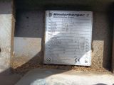 a sign on the side of a building that says kinderberger
