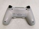 a close up of a video game controller on a table