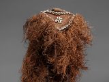 an image of a wig with a chain around it