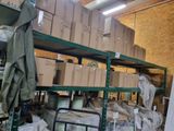 many boxes on the shelves in the warehouse