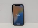 an iphone is sitting on top of a table with a blurry background