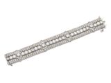 un bracelet en diamants et dix-huit pierres, signé Van Cleef