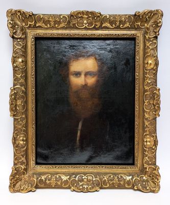 portrait of a bearded man with a pipe in a gold frame