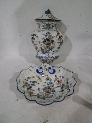 two vases that are sitting on top of each other