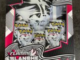 a close up of a box of pokemon cards on a table