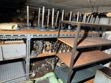 a room with a lot of shelves and a lot of tools