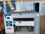 a machine that is sitting inside of a building