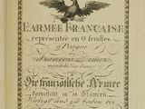 an old black and white book with a bird on top of it
