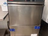 a stainless steel dishwasher sitting on top of a metal rack