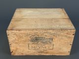 a wooden box that has a label on it