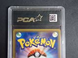 a close up of a pokemon card in a plastic case