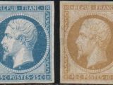 a couple of stamps that are sitting on top of each other