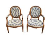 pair of louis xvi style armchairs with blue and white fabric