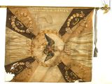 a banner with a bird on it hanging on a wall