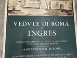 a poster on the wall of a building that says vedvete di roma inggres