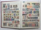 a book with a lot of stamps inside of it