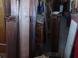 a lot of furniture in a room with a lot of boxes