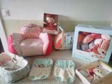 a lot of baby items that are on the floor