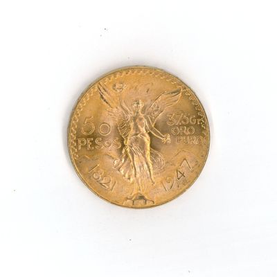 une pièce d'or avec l'image d'une femme dessus