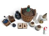 a wicker basket with a bottle and other items on it