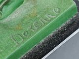 a close up of a statue of a person on a skateboard