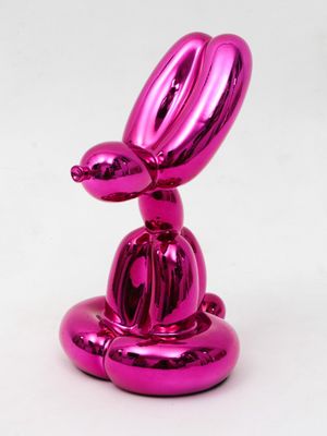 pink balloon rabbit sculpture on a white background