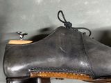 a close up of a pair of shoes that are on a table