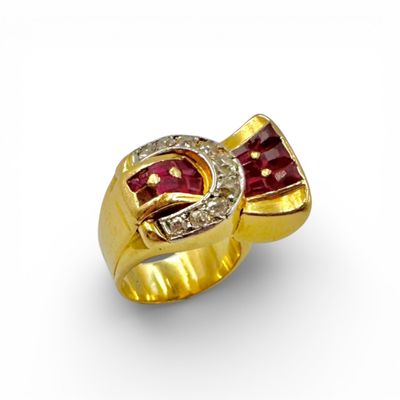 Bague en or jaune (750) et platine (850) à décor d'un noeud … - Photo 1